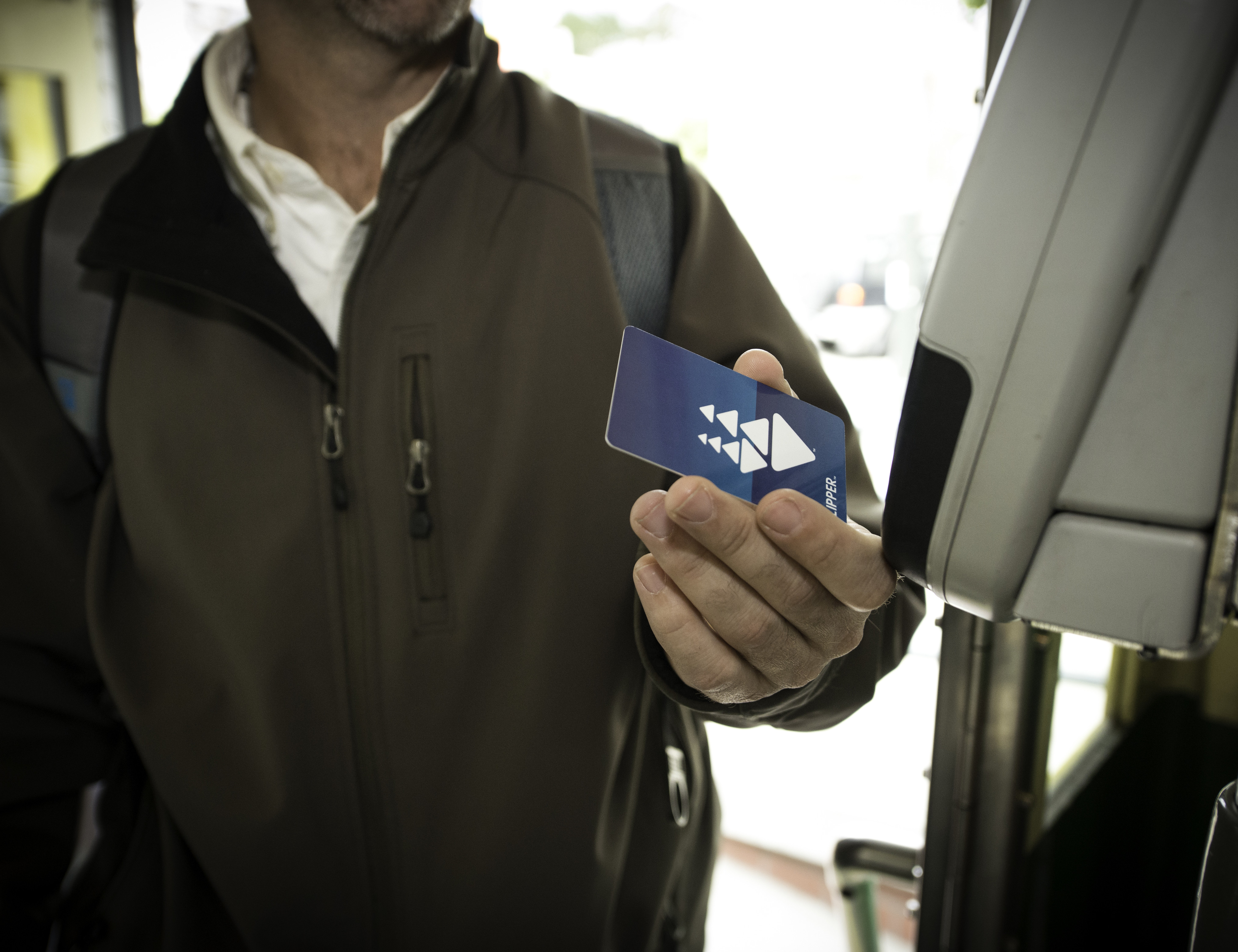 Modern on-board PoP fare payment using an RFID payment card, San Francisco (credit: SFMTA)
