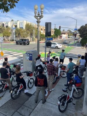 On a bike tour, participants stopped to learn about a protected intersection design on 17th Street.