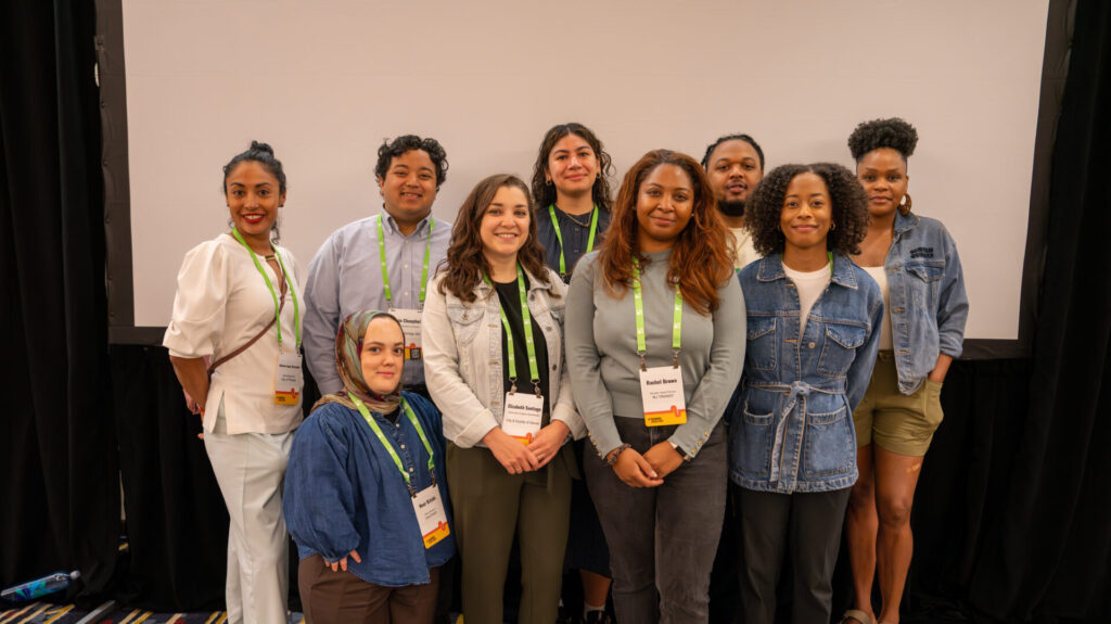 The 2024-2025 Transportation Justice Fellows pose, smiling. 