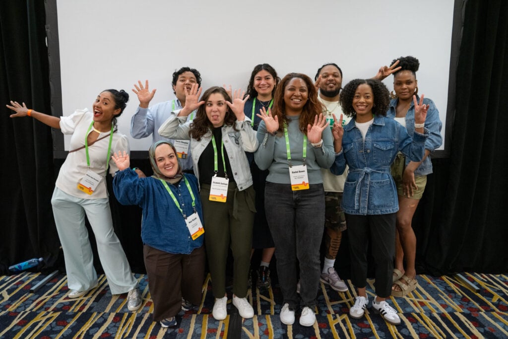 The 2024-2025 Transportation Justice Fellows pose, smiling.