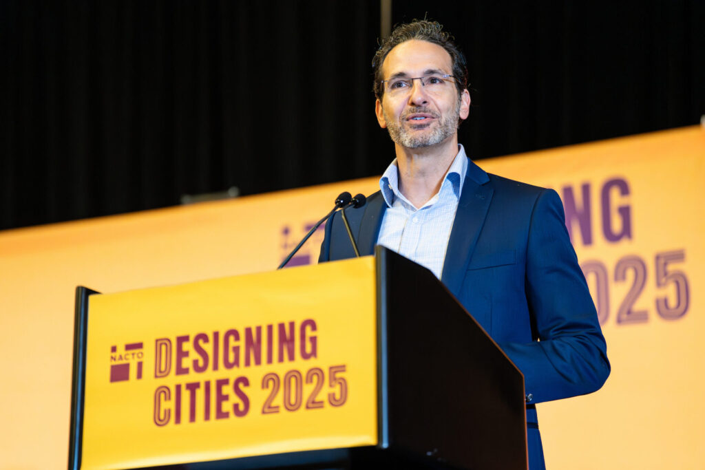 NACTO Executive Director Ryan Russo speaks at Designing Cities 2025 in Washington DC