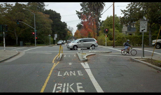 Forced Right Turn - Palo Alto, CAA forced right turn diverts through motor vehicle traffic while allowing through bicycle movements.
